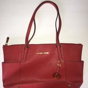 Never used Michael Kori Purse. Authentic.